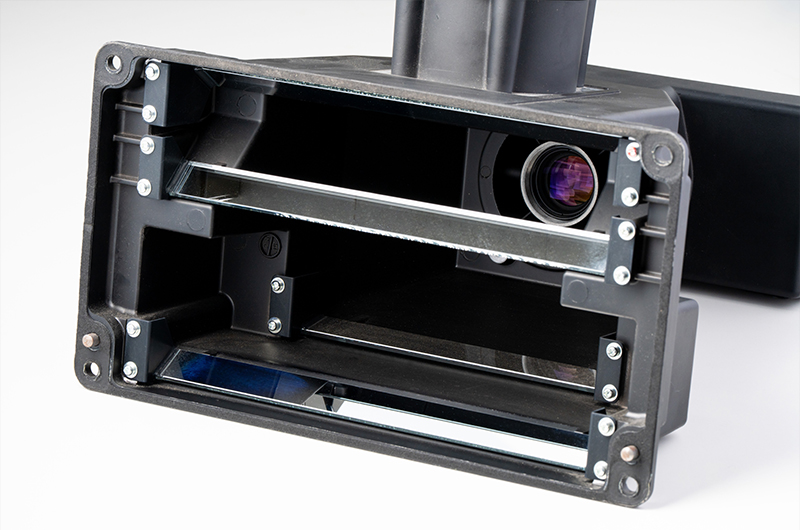 A camera integrated with a mirror, built into the rice color sorter.